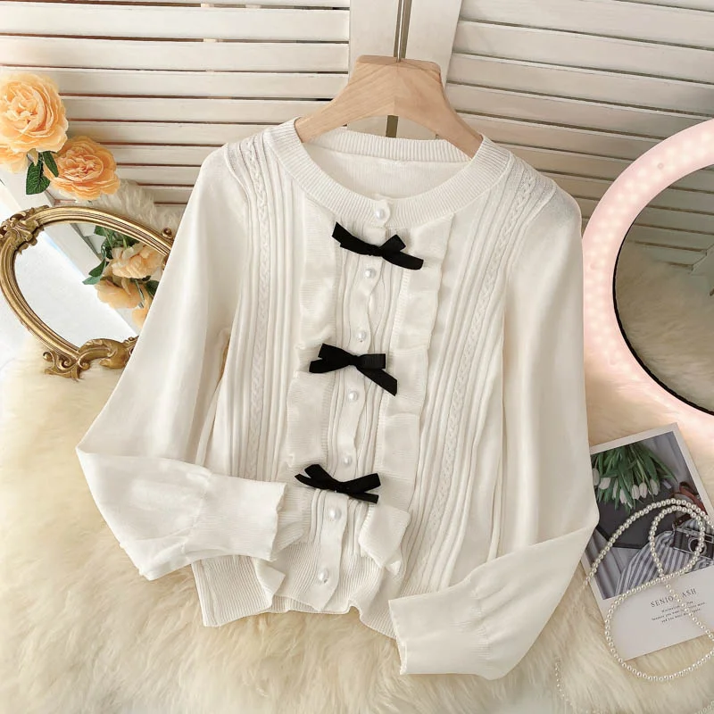 Lovely bow-knot long-sleeved cardigan sweater  010